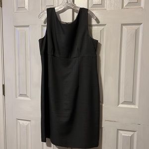 Two piece gray women’s dress suit. Size 18. Like new. No stains or holes.